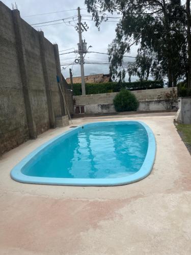 Swimmingpoolen hos eller tæt på Chácara Aconchego da Serra