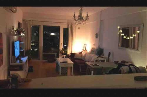 Khu vực ghế ngồi tại depto con seguridad y pileta, mi casa es tu casa, lo de Dani