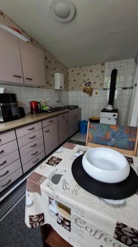 a kitchen with a table with a plate on it at Haus in Malchow in Malchow