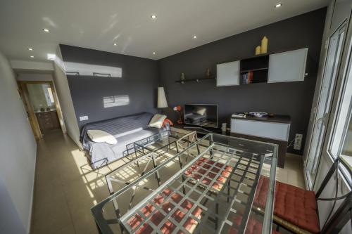 Postel nebo postele na pokoji v ubytování Piso reformado en Tossa con terraza y AA