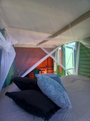 Postel nebo postele na pokoji v ubytování Green House Hostel