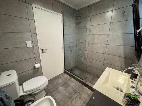 Koupelna v ubytování Casa con pileta en Funes