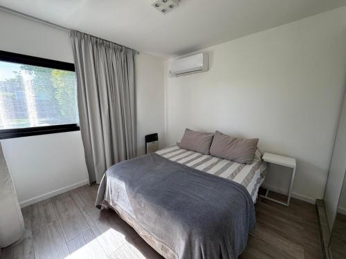 Postel nebo postele na pokoji v ubytování Casa con pileta en Funes