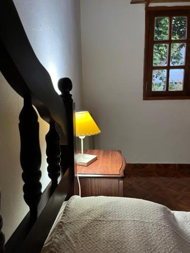 En eller flere senge i et værelse på Departamento Aagaard Brandt