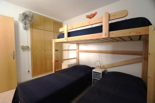 En eller flere senge i et værelse på Costa linda 113