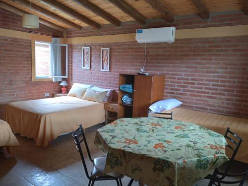 Postel nebo postele na pokoji v ubytování Complejo cabañas Victor II