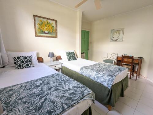 Postel nebo postele na pokoji v ubytování Rio Guesthouses