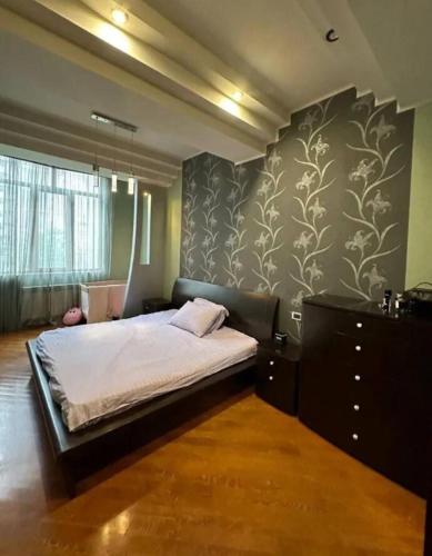 Ένα ή περισσότερα κρεβάτια σε δωμάτιο στο Luxe Apartment