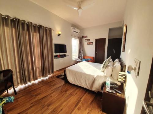 Et tv og/eller underholdning på Vrindavan suites at omaxe enternity