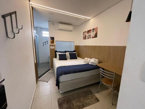 Ένα ή περισσότερα κρεβάτια σε δωμάτιο στο Green It Motel & Hotel