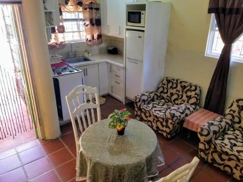 Kuchyň nebo kuchyňský kout v ubytování Rio Guesthouses