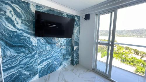 Et tv og/eller underholdning på Casa 2 quartos Mirante Piratininga