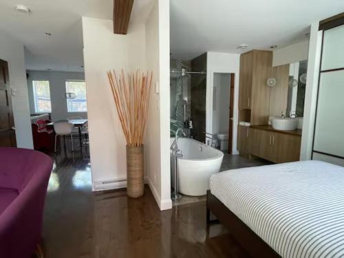 En eller flere senge i et værelse på Chouette loft urbain avec foyer