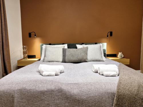 En eller flere senge i et værelse på Hévíz Luxury by STN