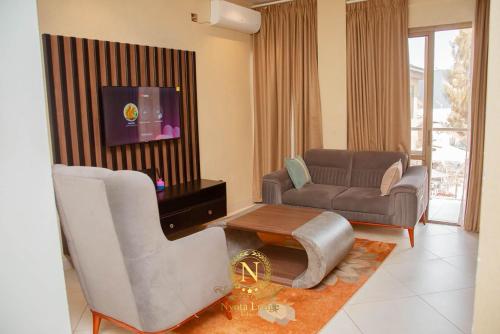 Khu vực ghế ngồi tại Nyota Lodge Hôtel