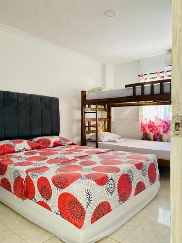 Ένα ή περισσότερα κρεβάτια σε δωμάτιο στο Rodadero Ocean View Apartment