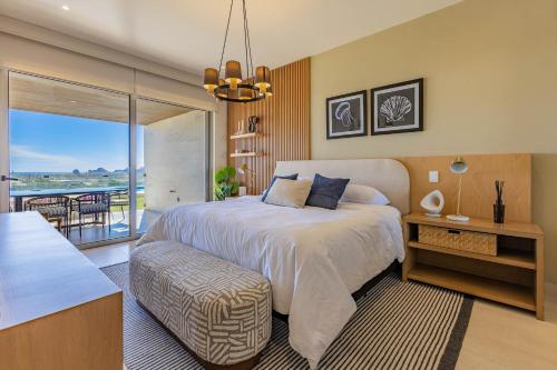 En eller flere senge i et værelse på Vista Del Arco - Vista Vela Sunset