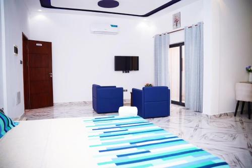 Et tv og/eller underholdning på Résidence Flowers House