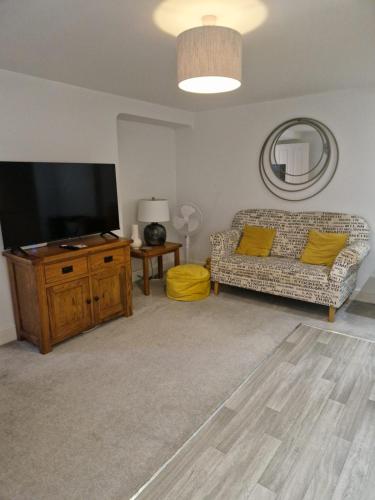 Et tv og/eller underholdning på Cosy central apt Free parking Wi-Fi