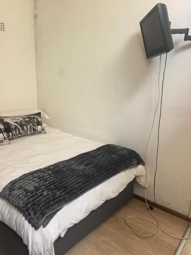 En eller flere senge i et værelse på 22 on BREEZAND