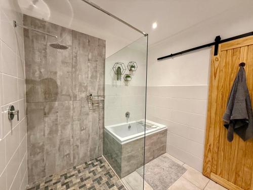 Et badeværelse på Esigodini Cottage