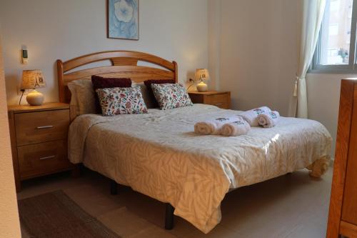 En eller flere senge i et værelse på Apartment with balcony, Cabo Roig, La Rotonda