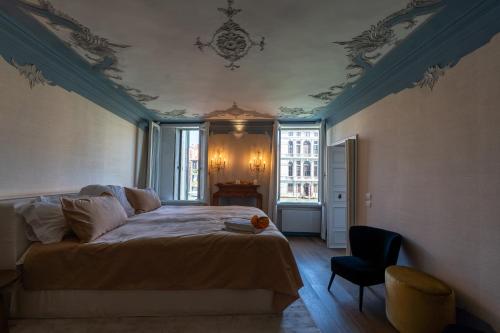 En eller flere senge i et værelse på Ca' Luce Canal Grande