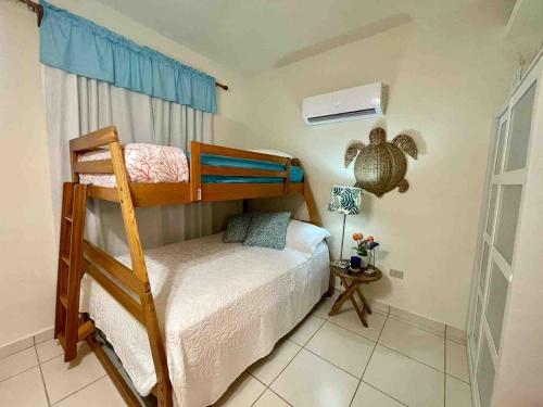 En eller flere senge i et værelse på Atlantic Wave Villa