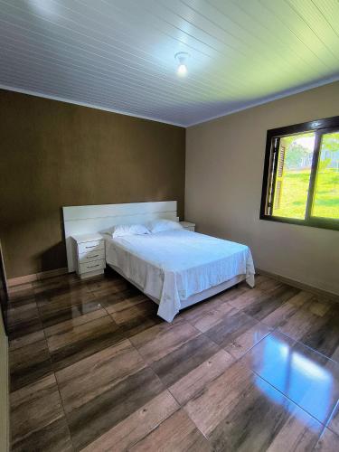 En eller flere senge i et værelse på Rifugio Val Di Monti