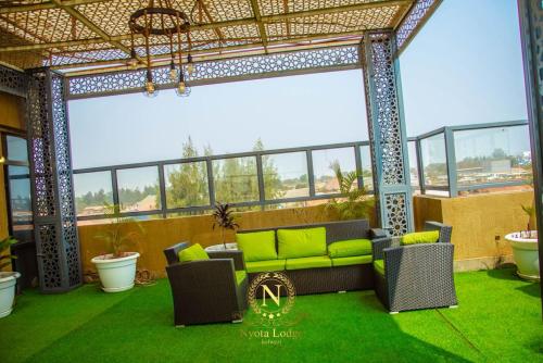 Posezení v ubytování Nyota Lodge Hôtel