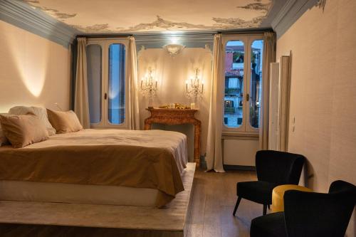 En eller flere senge i et værelse på Ca' Luce Canal Grande