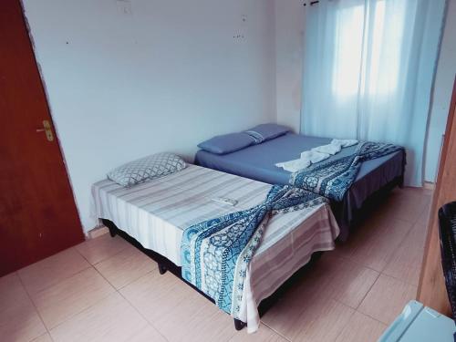 Postel nebo postele na pokoji v ubytování Pousada Beach Porto Novo