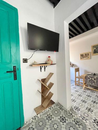 Et tv og/eller underholdning på Riad El Hania Mogador