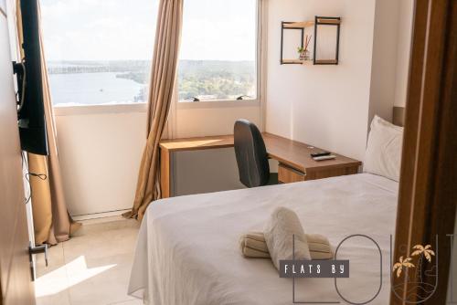 Ένα ή περισσότερα κρεβάτια σε δωμάτιο στο Paiva Flats by loui 3