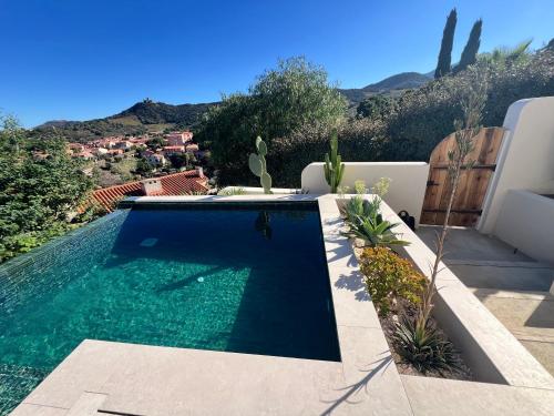 Bazén v ubytování Can Jeannette Vue Mer & Montagne - Lodge 2 nebo v jeho okolí