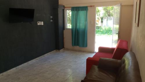 Et opholdsområde på CASA CON PILETA Selecciona casa, Loft o pieza