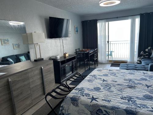 Postel nebo postele na pokoji v ubytování Daytona Inn