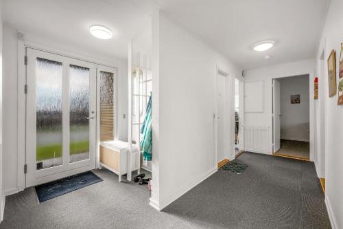 Et badeværelse på Cozy home for a family for stay