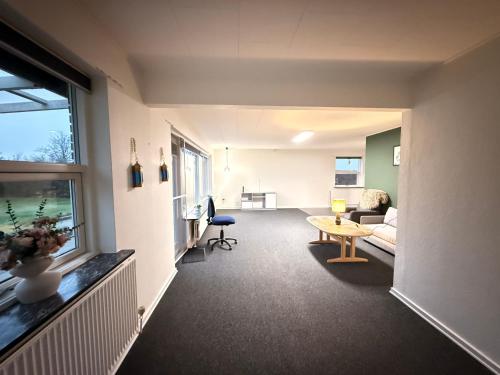 Et opholdsområde på Cozy home for a family for stay