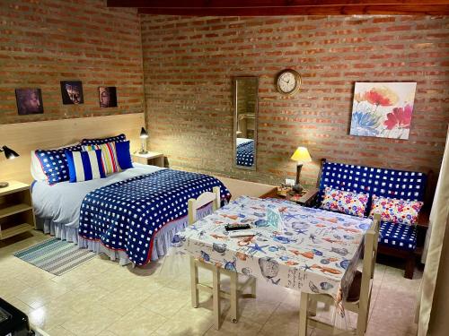 Postel nebo postele na pokoji v ubytování One Apart Mono 6