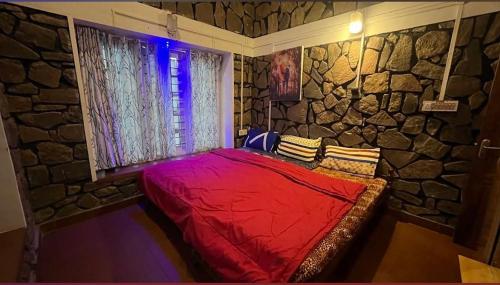 En eller flere senge i et værelse på Stone Villa Vagamon