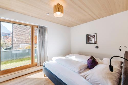 Postel nebo postele na pokoji v ubytování Gretina Appartements