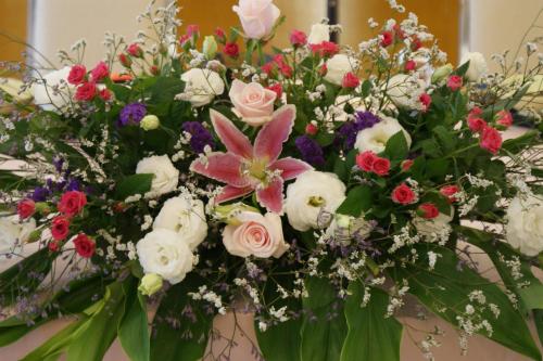 a bouquet of flowers in a vase at Akakura Hotel in Myoko