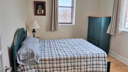 Postel nebo postele na pokoji v ubytování Le Loft des Milles-Îles