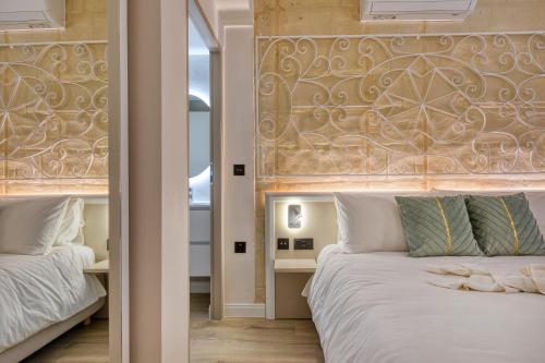 Postel nebo postele na pokoji v ubytování 7 Main Gate