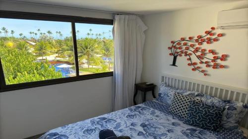 Giường trong phòng chung tại Malawi Beach Resort - Flat SKY