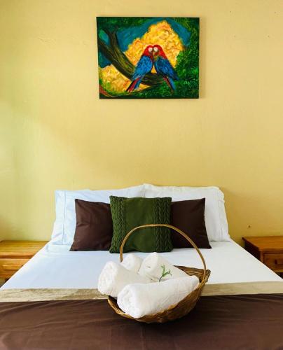 Ένα ή περισσότερα κρεβάτια σε δωμάτιο στο Pousada Oxente Uai!