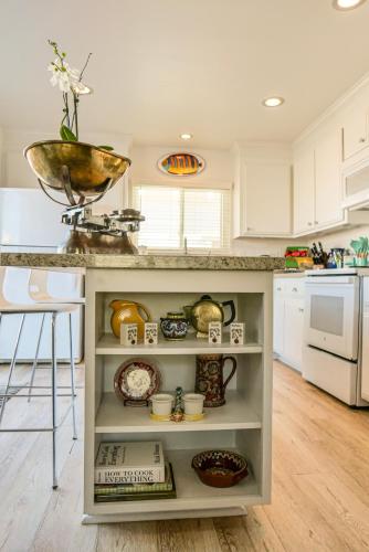 a kitchen with a counter with a bowl on top at 2 Bdr 2 bath luxury home steps away from Mission Beach 5 min from Belmont in San Diego