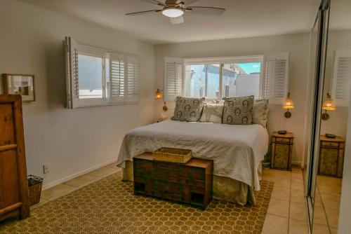 a bedroom with a bed and a window at 2 Bdr 2 bath luxury home steps away from Mission Beach 5 min from Belmont in San Diego