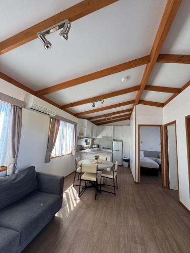 a living room with a couch and a table at Great Western Motel in Great Western